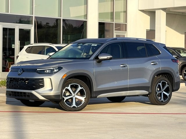 2025 Volkswagen Tiguan 2.0T SE in Pyrite Silver Metallic — front three-quarter view